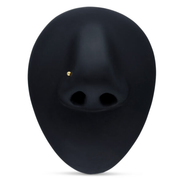 Pendiente nasal de oro de 750 en pantalla negra con forma de nariz