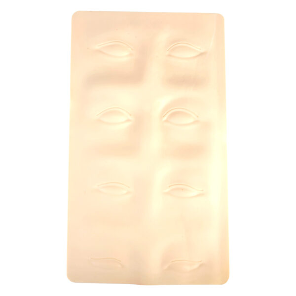 Placa de silicona beige con contornos de cejas sobre fondo blanco