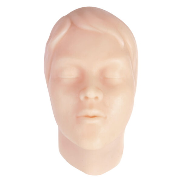 Forma de rostro de silicona beige para prácticas de tatuajes sobre fondo blanco