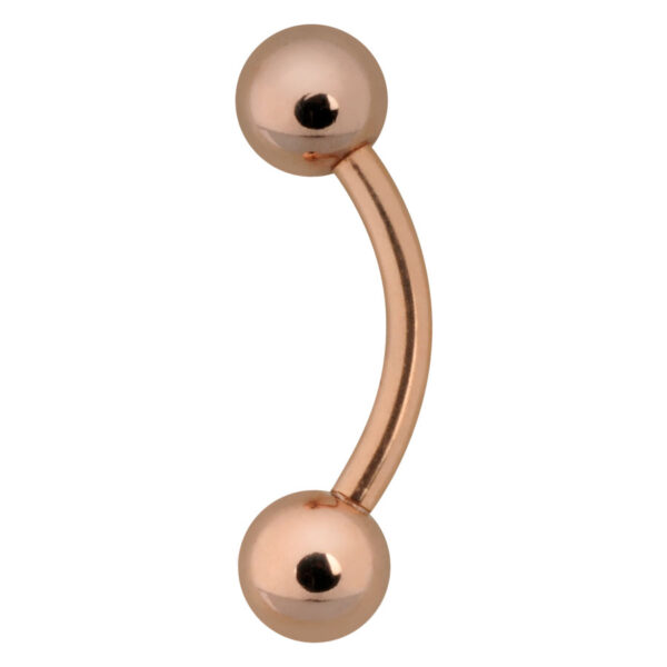 Piercing de ombligo en oro rosa con dos bolas sobre fondo blanco