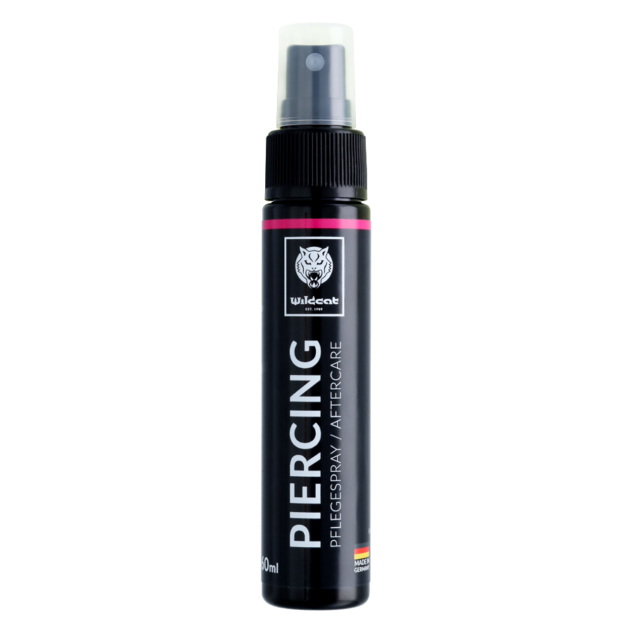 Wildcat Spray para Cuidado de Piercings 30ml Botella de spray negra con el logo de Wildcat, inscripción 'Spray para cuidado de piercings', 30ml