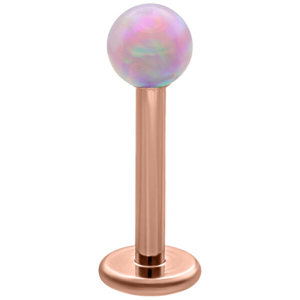 Micro Labret de bola de ópalo sintético rosa con barra de titanio dorado rosa sobre fondo blanco