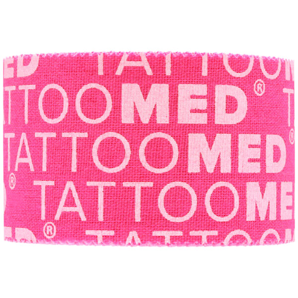 Cinta Tattoomed Studio Pro rosa con letras blancas sobre fondo neutro