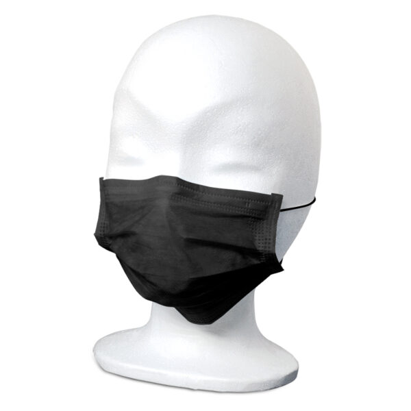 Mascarilla negra sobre una cabeza de modelo blanca en foto de estudio