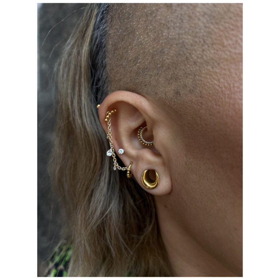 Oreja con cadena de piercing dorada y plateada, cristal claro