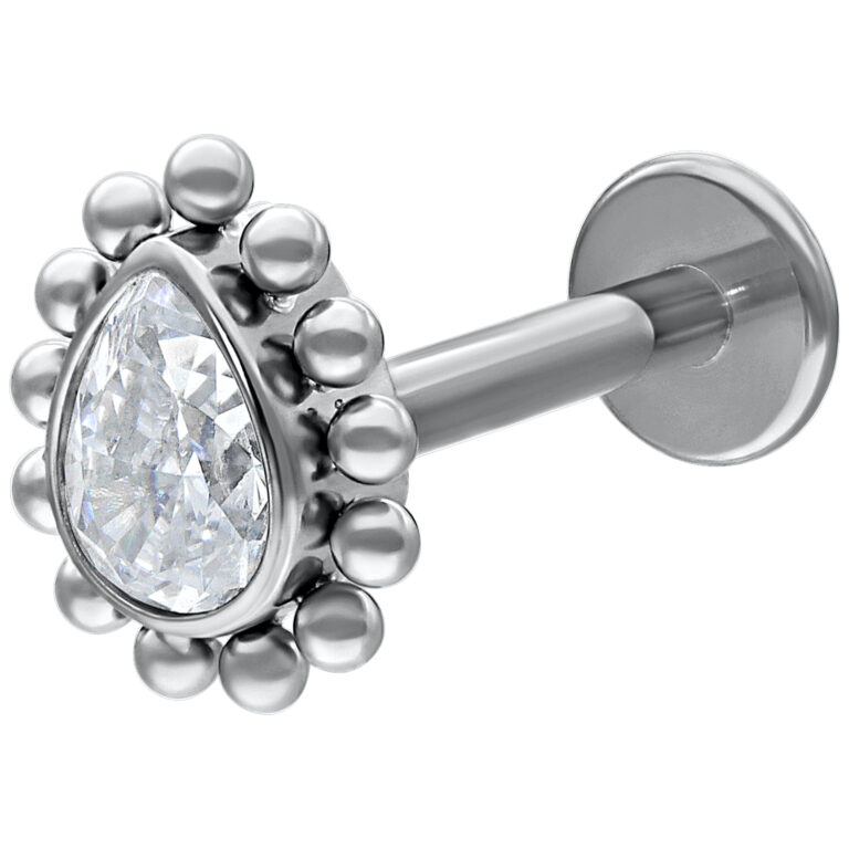 Labret de oro blanco con cristal en forma de lágrima sobre fondo blanco