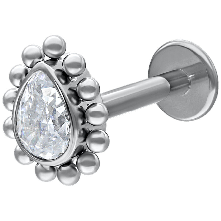 Labret de oro blanco con cristal en forma de lágrima sobre fondo blanco