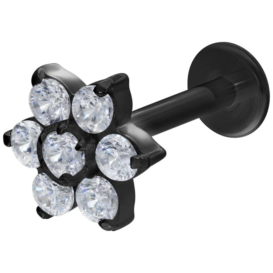 Labret negro con piedras de flores cristalinas sobre fondo blanco
