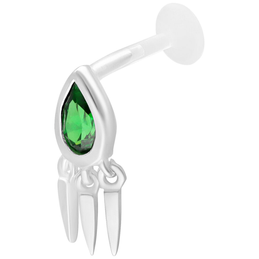 Labret plateado con esmeralda verde y tres colgantes sobre fondo blanco