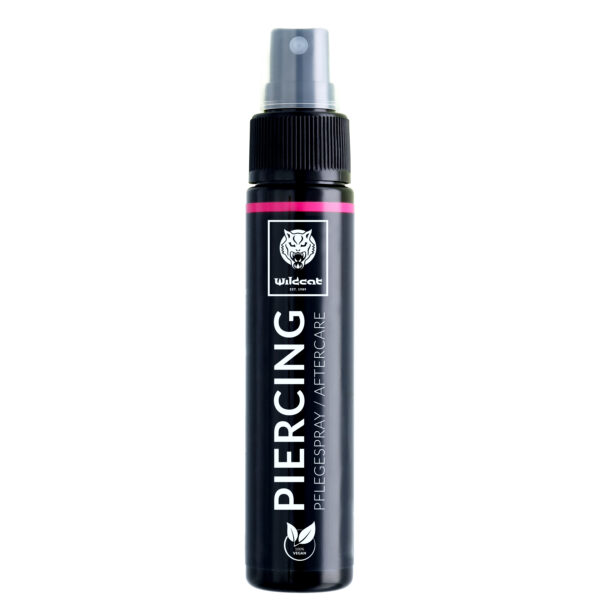 Botella negra de spray para piercings con cabezal gris sobre fondo blanco