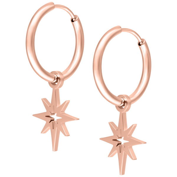 Aros de oro rosado con colgante de estrella sobre fondo blanco