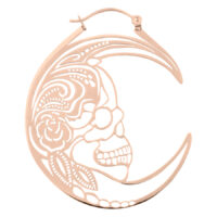 Pendientes de oro rosa con diseño de calavera sobre fondo blanco