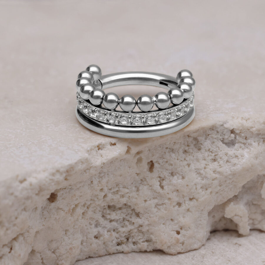 Triple Bubble Crystal Clicker plateado sobre piedra clara