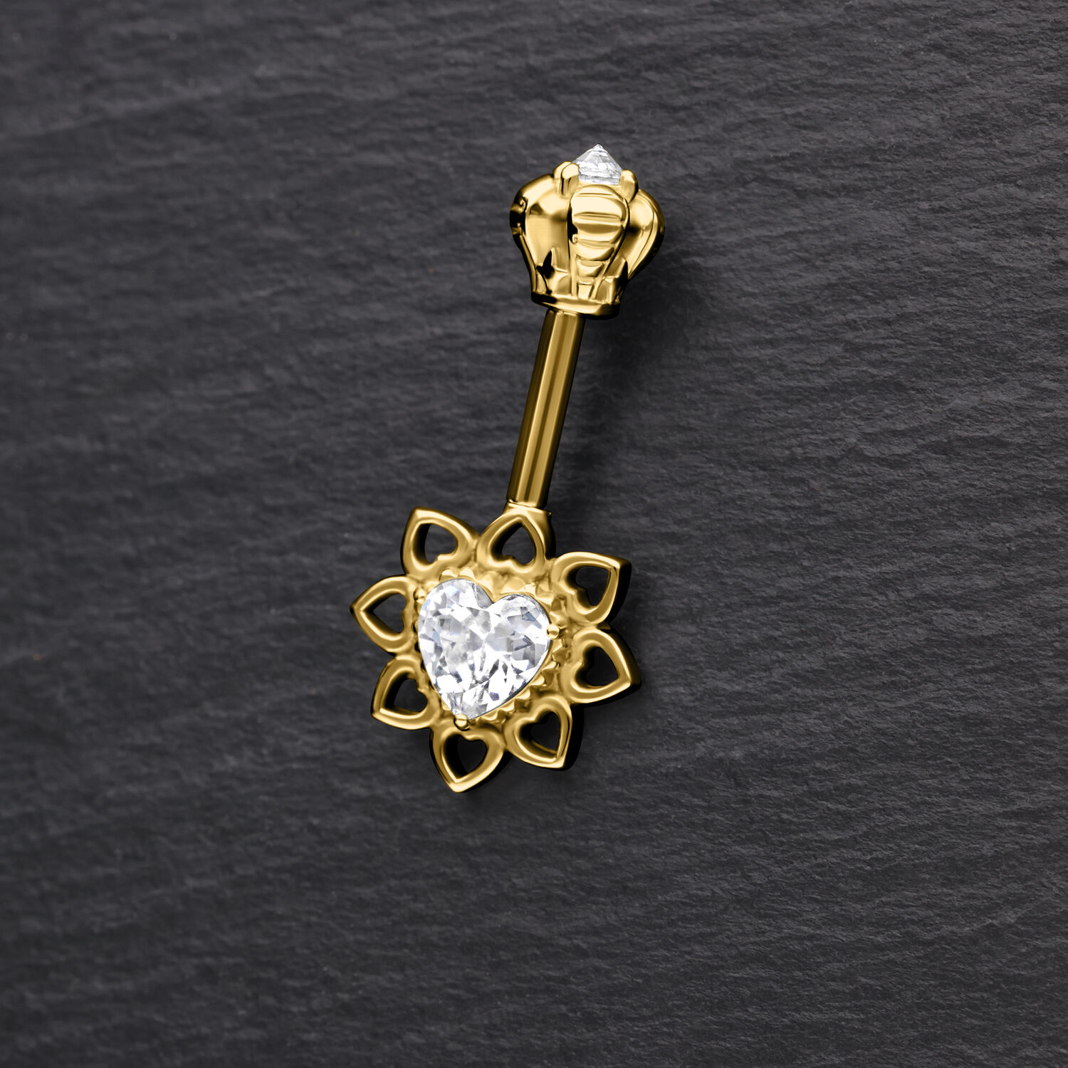 Barbell Helix dorado vertical con cristal en forma de corazón sobre fondo negro
