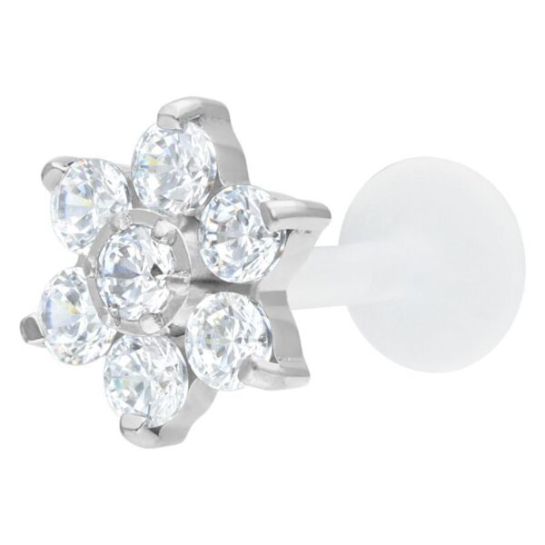 Labret con flor de cristal plateada sobre fondo blanco