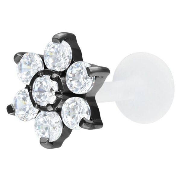 Labret negro con forma de flor cristalina sobre fondo blanco