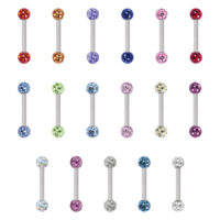 Coloridos Piercings de Titanio Barbells 16 piezas Dieciséis piercings barbells de titanio coloridos, cada uno con dos bolas de cristal en diferentes colores, sobre fondo blanco.