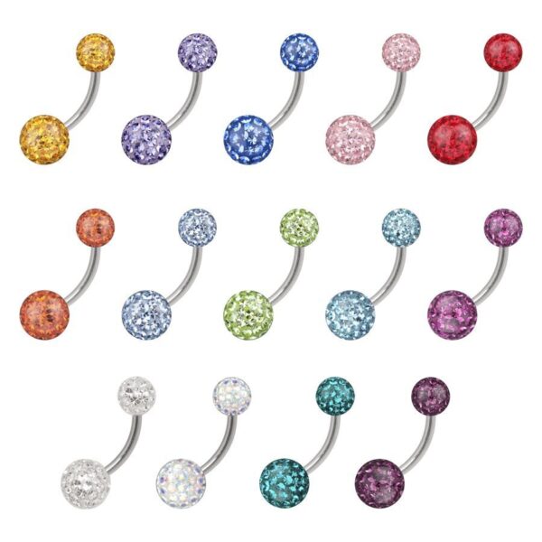 Piercings para ombligo de titanio con bolas de cristal de colores brillantes sobre fondo blanco