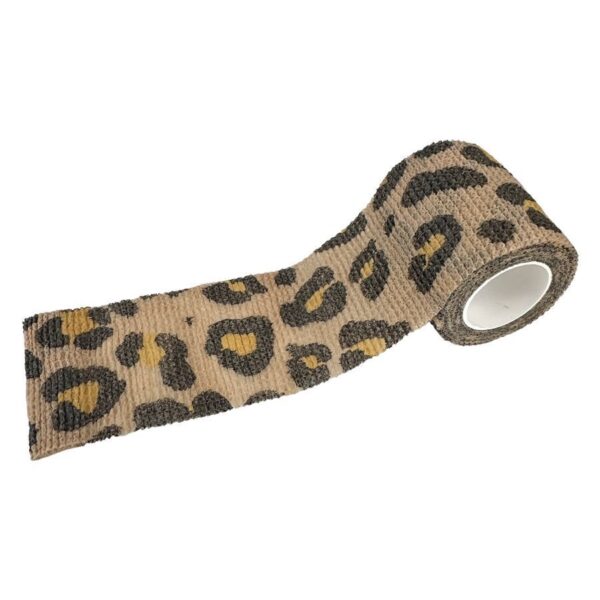 Venda de agarre marrón y beige con estampado de leopardo sobre fondo blanco