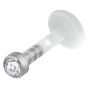 Labret aus Bioplast mit kristallklarem Stein und Titanaufsatz auf weißem Hintergrund