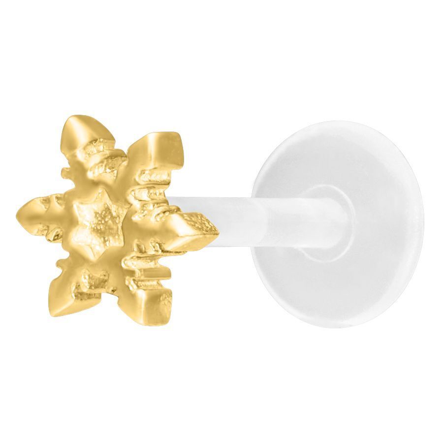 Piercing Labret Push-Fit de Copo de Nieve Dorado sobre fondo blanco