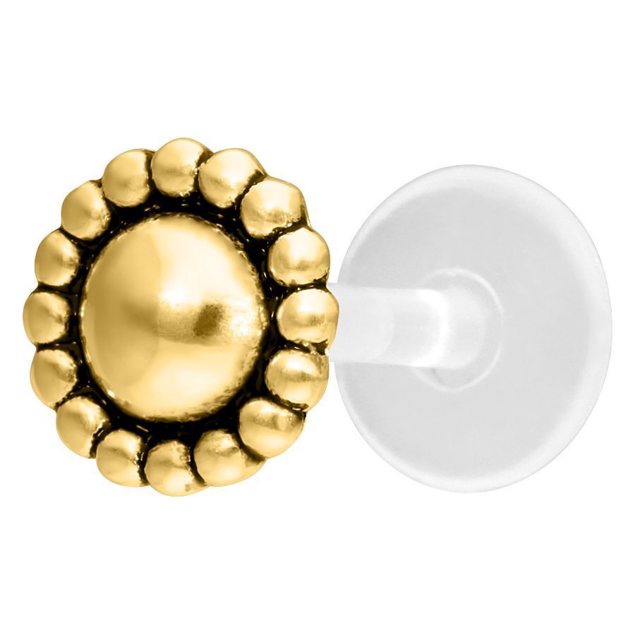 Labret Push-Fit Piercing dorado con adorno redondo sobre fondo blanco