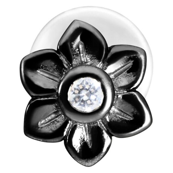 Labret negro en forma de flor con cristal claro sobre fondo blanco