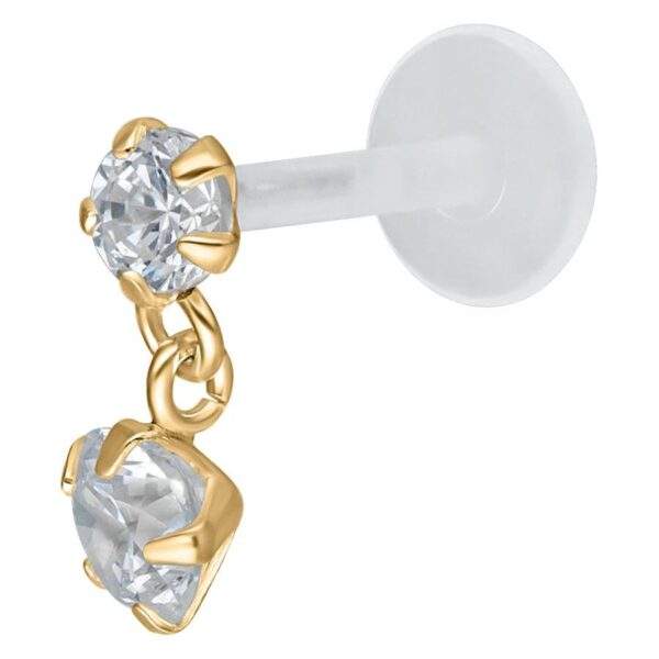 Labret dorado con colgante de cristal claro sobre fondo blanco