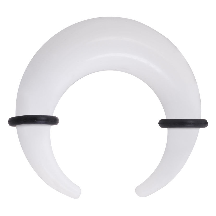 Crescent de silicona blanco y negro para oreja Crescent de silicona blanca con anillos negros sobre fondo blanco