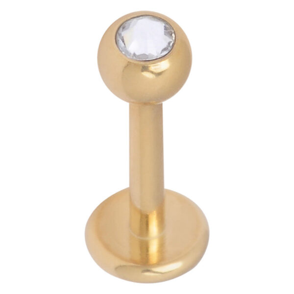 Labret dorado con piedra cristalina sobre fondo blanco