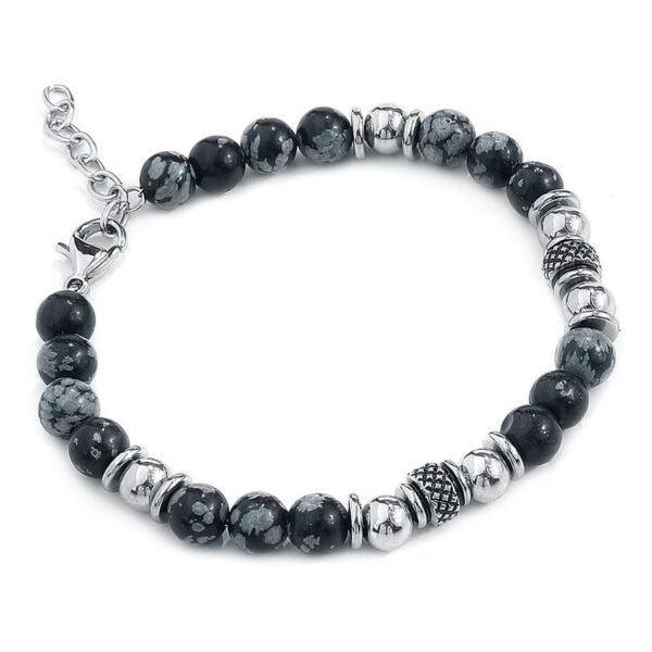 Pulsera Clastic Rock con cuentas negras y plateadas sobre fondo blanco