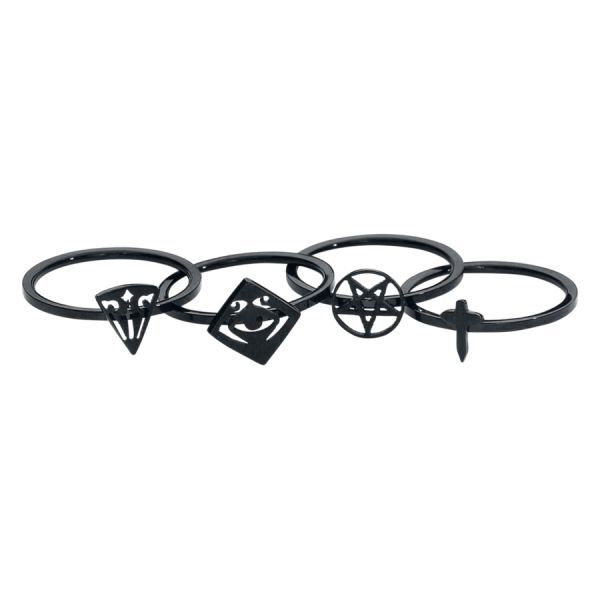 Cuatro anillos negros para nudillos de acero quirúrgico con diferentes símbolos sobre fondo blanco