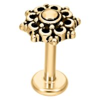 Labret dorado con diseño de mandala, de acero quirúrgico, sobre fondo blanco