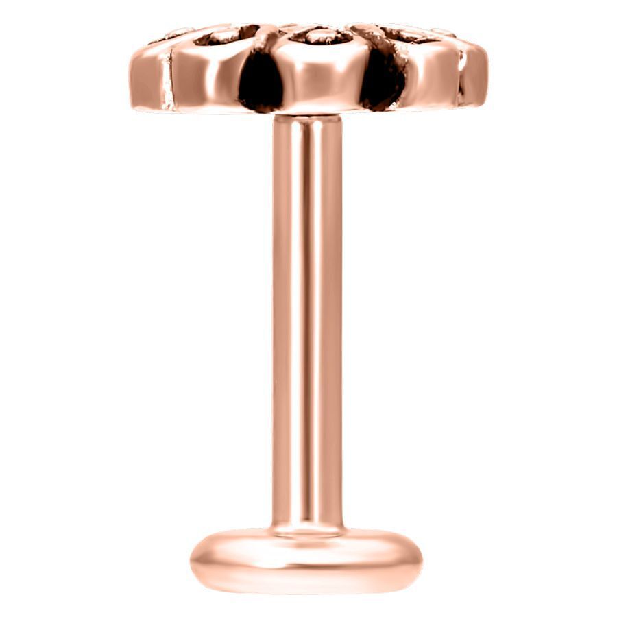 Labret de oro rosado con diseño floral sobre fondo blanco