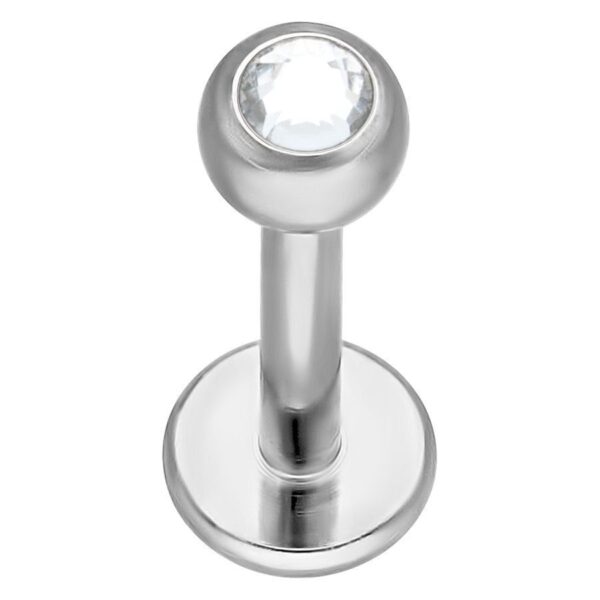 Labret plateado con piedra cristalina sobre fondo blanco