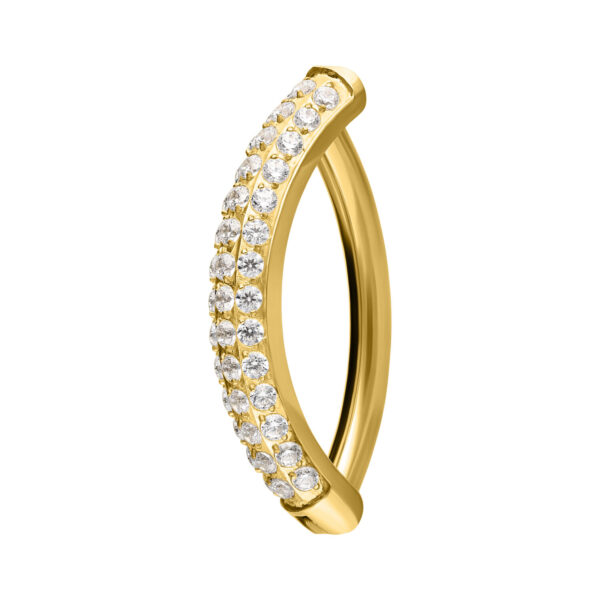 Clicker dorado para ombligo con piedras preciosas brillantes sobre fondo blanco