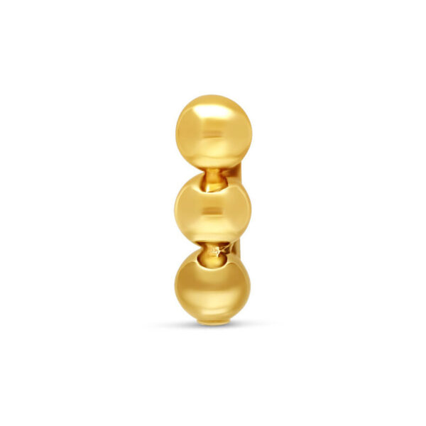 Accesorio de oro 585 con tres bolas brillantes sobre fondo blanco