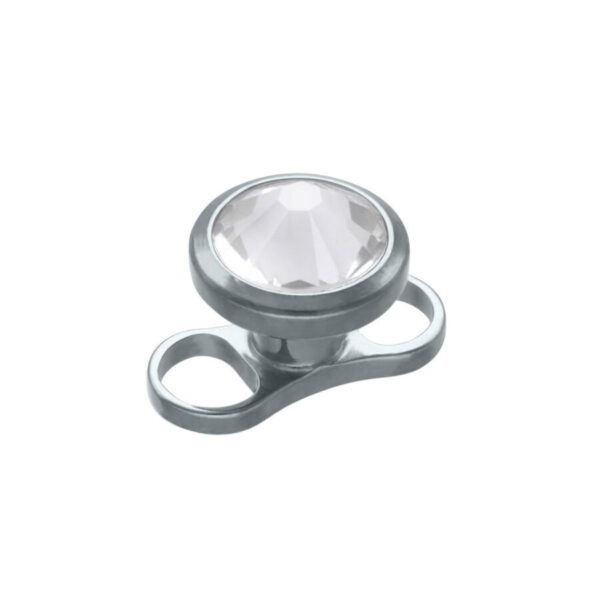 Ancla Dermal de Titanio Plateado con cristal claro sobre fondo blanco