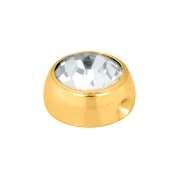 Pieza de piercing dorada con cristal claro sobre fondo blanco