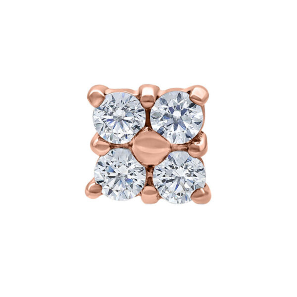 Accesorio color oro rosado con cuatro cristales claros, vista frontal