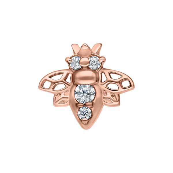 Aplique de piercing en forma de abeja en oro rosa con cristales claros sobre fondo blanco