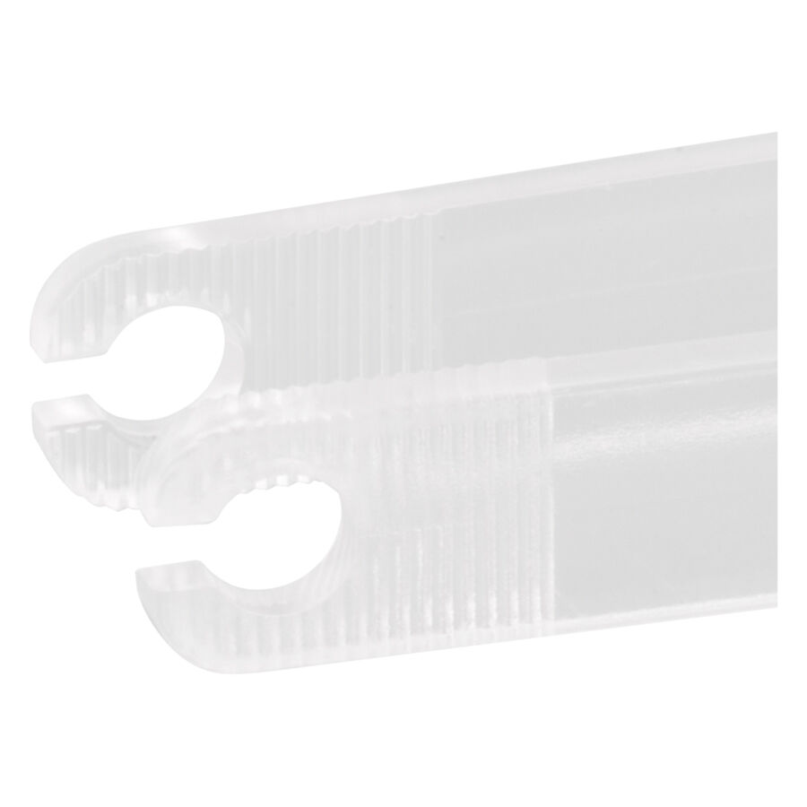 Pinza desechable estéril transparente Pinza desechable estéril transparente y redonda sobre fondo blanco