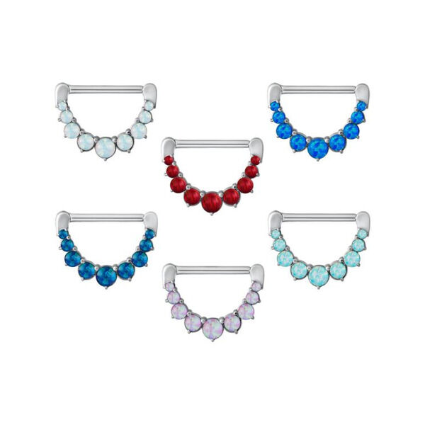 Seis clickers para pezón con ópalos sintéticos en menta, rosa, blanco, azul oscuro y rojo sobre fondo blanco