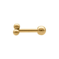 Piercing Barbell dorado con dos bolas sobre fondo blanco