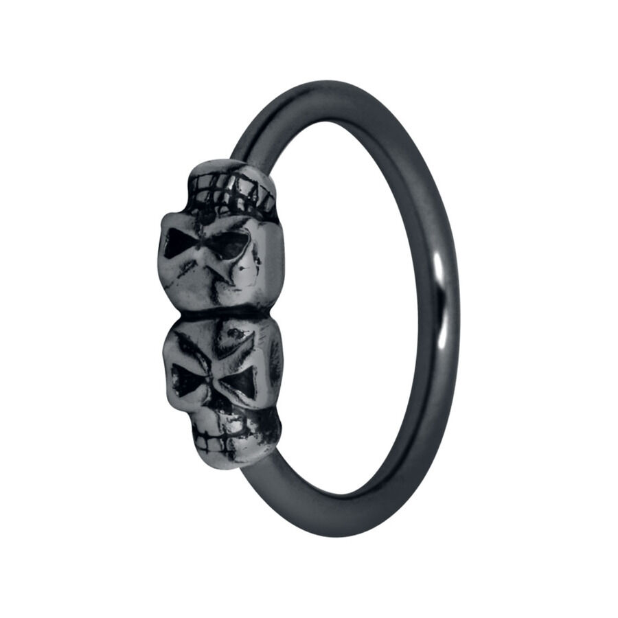 Anillo Negro Mini Skulls de Acero Quirúrgico Anillo negro con mini calaveras, de plata y acero quirúrgico, sobre fondo blanco