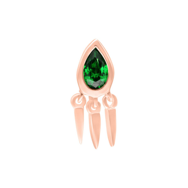 Accesorio de oro rosa con cristal verde sobre fondo blanco