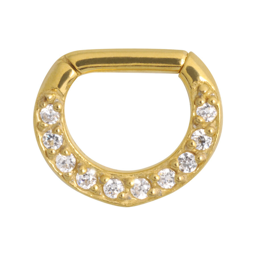 Clicker de septum dorado con cristales Clicker de septum dorado con cristales claros sobre fondo blanco
