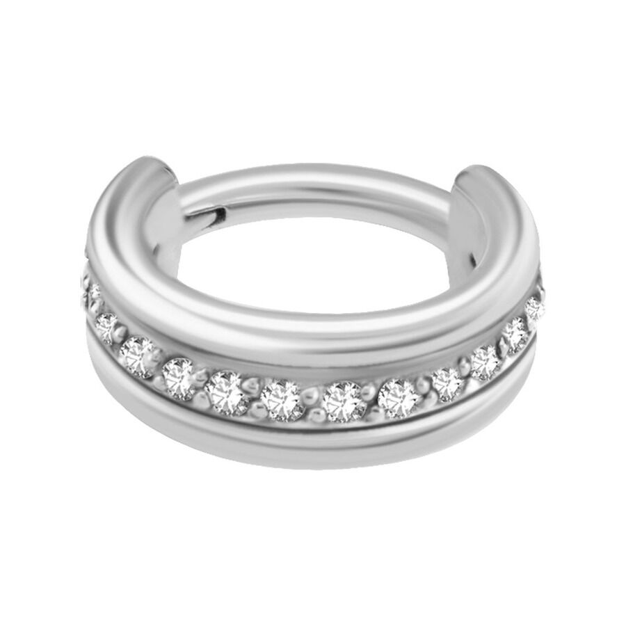 Clicker de piercing plateado con cristales brillantes sobre fondo blanco