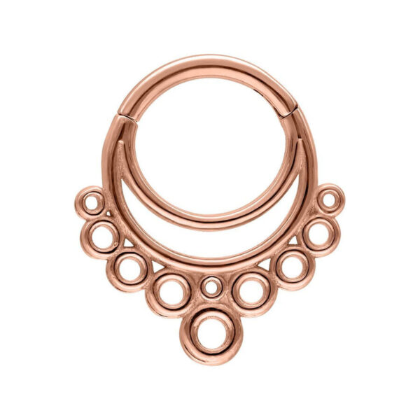 Clicker de septum en oro rosa con diseño de burbujas sobre fondo blanco