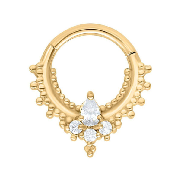Aro de piercing dorado con cristales sobre fondo blanco